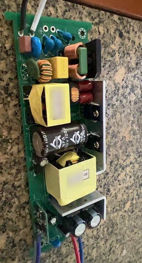 Power-supply circuit board with transformers, filter chokes and electrolytic capacitors
